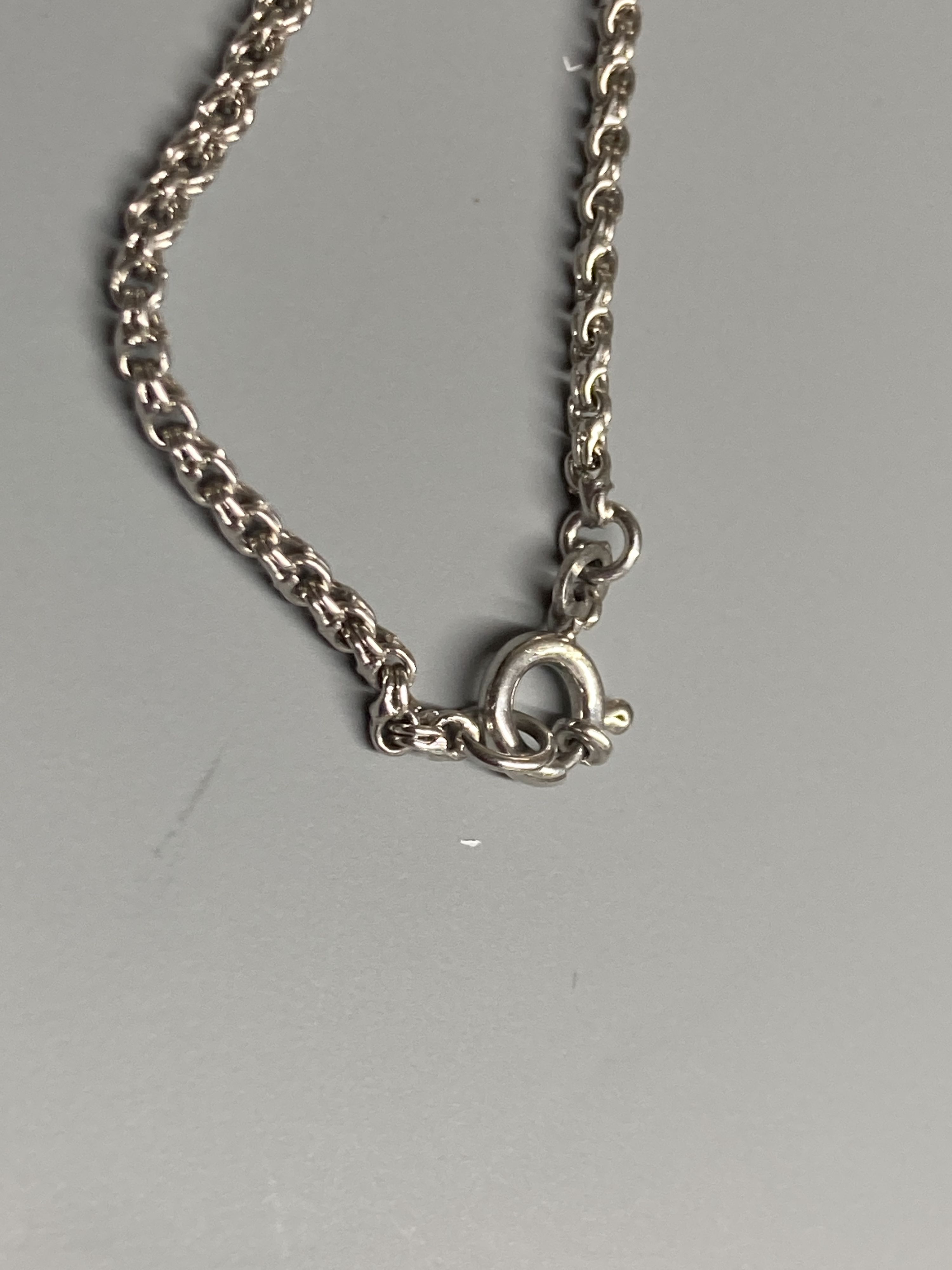 A modern 9ct white gold necklace with yellow gold baton links, 78cm